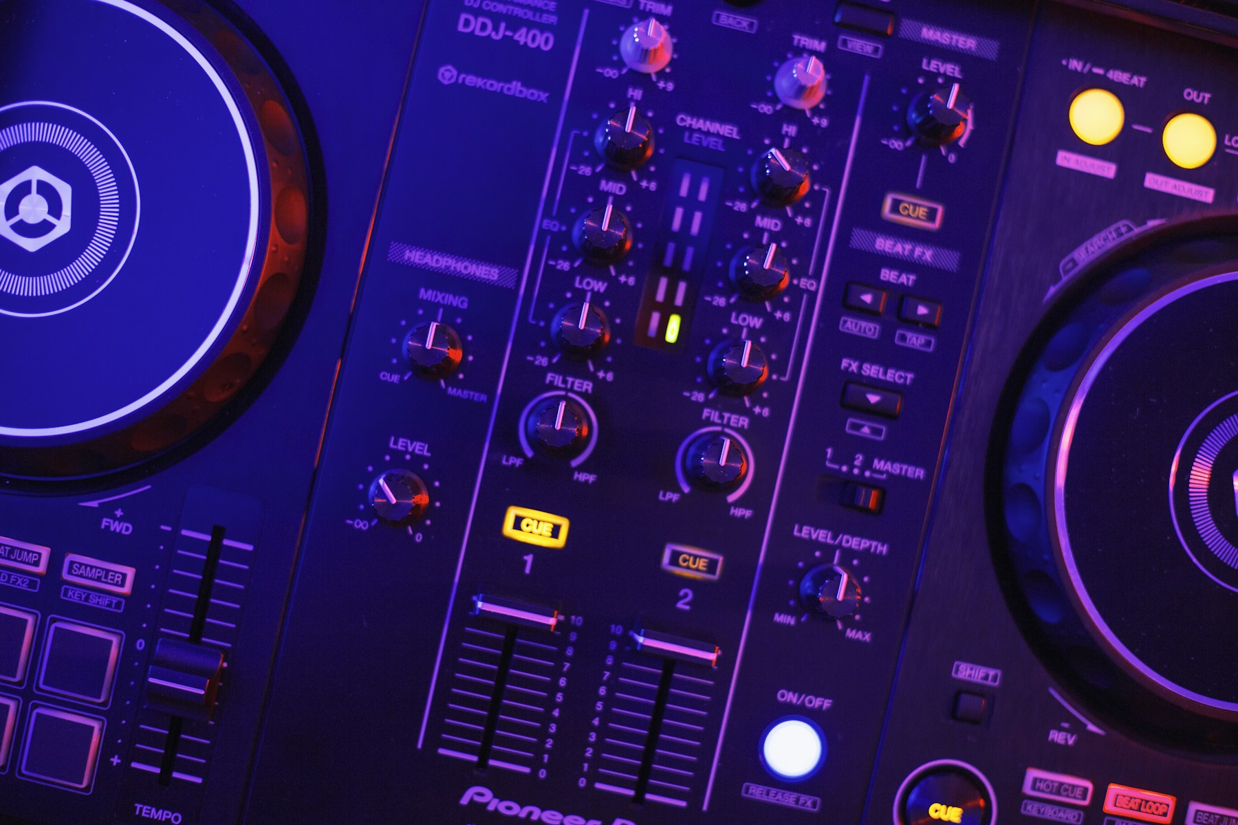 Close-up of a DJ mixer and decks; illustrative stock photography